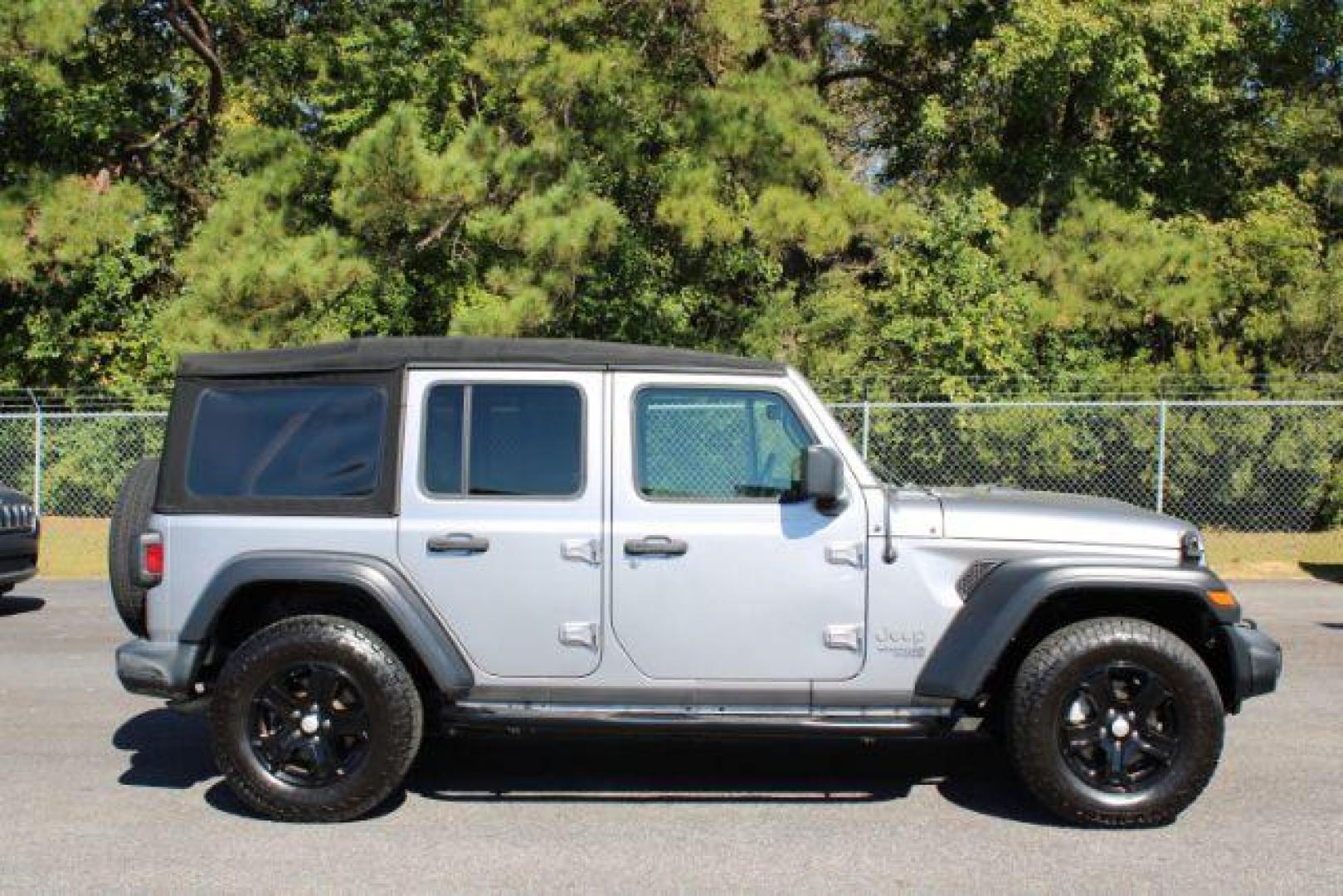 2018 Jeep Wrangler Unlimited Sport (1C4HJXDG1JW) with an 3.6L V6 DOHC 24V FFV engine, 6-Speed Automatic transmission, located at 9146 Ocean Hwy West, Calabash, NC, 28467, (910) 579-1110, 33.928635, -78.576157 - 2018 Jeep Wrangler Unlimited Sport - Photo#1