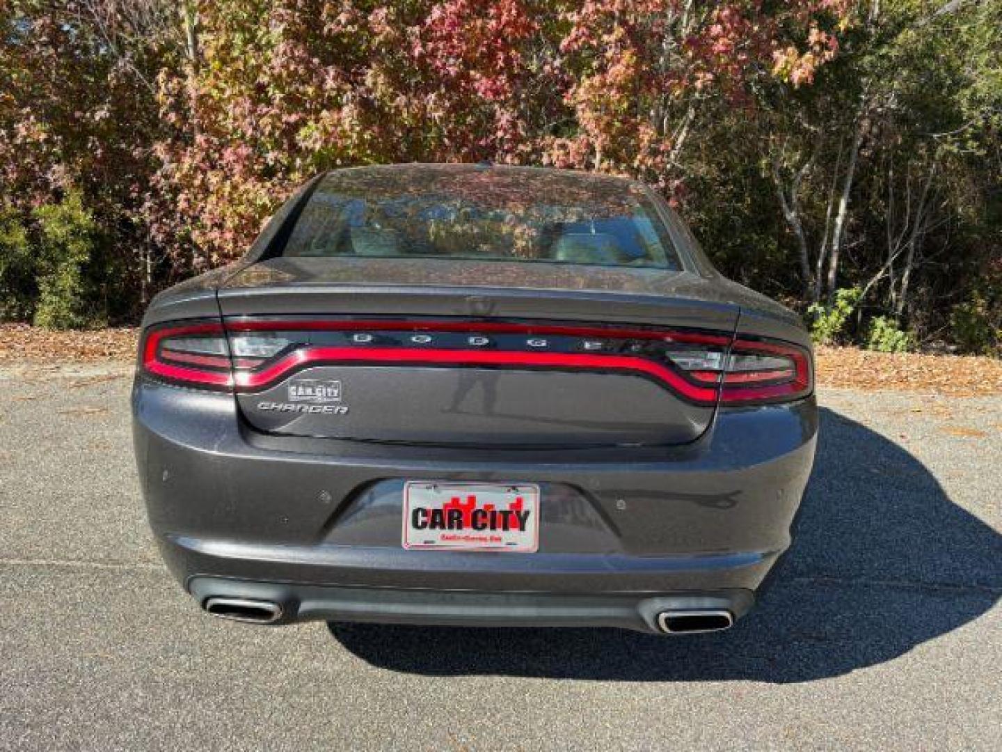 2022 /BLACK LEATHER Dodge Charger SXT (2C3CDXBG4NH) with an 3.6L V6 DOHC 24V engine, 8-Speed Automatic transmission, located at 2761 East Hwy 501, Conway, SC, 29526, (843) 331-1151, 33.781528, -78.989883 - 2022 Dodge Charger SXT - Photo#4