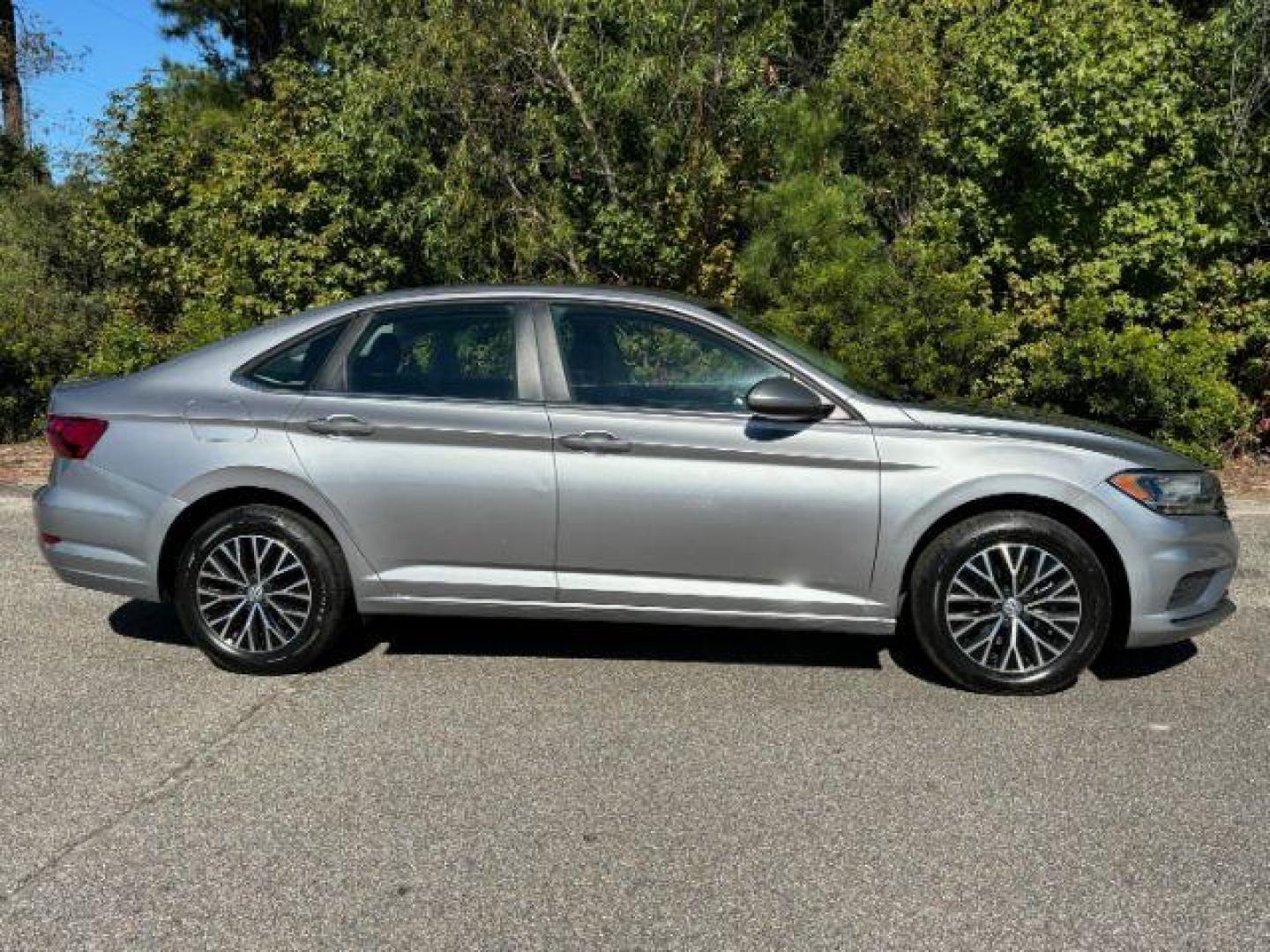 2021 /Storm Gray Volkswagen Jetta 1.4T SE 8A (3VWC57BU3MM) with an 1.4L L4 DOHC 16V engine, 8-Speed Automatic transmission, located at 2761 East Hwy 501, Conway, SC, 29526, (843) 331-1151, 33.781528, -78.989883 - 2021 Volkswagen Jetta 1.4T SE 8A - Photo#2