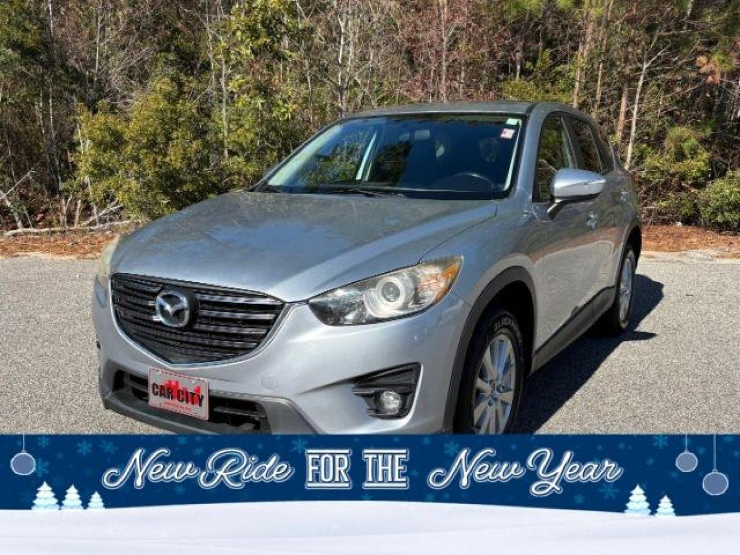 2016 /Black, premium cloth Mazda CX-5 Touring (JM3KE2CY2G0) with an 2.5L L4 DOHC 16V engine, 6-Speed Automatic transmission, located at 2761 East Hwy 501, Conway, SC, 29526, (843) 331-1151, 33.781528, -78.989883 - 2016 Mazda CX-5 Touring - Photo#0