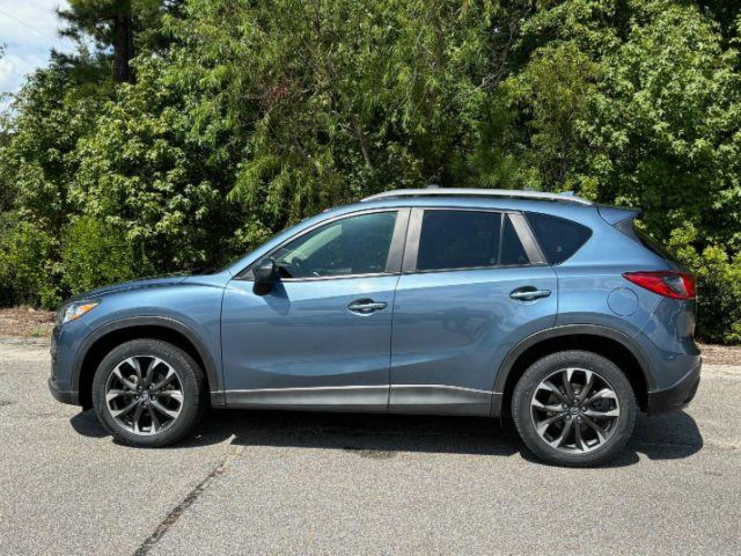 2016 /Black, leather Mazda CX-5 Grand Touring AWD (JM3KE4DY3G0) with an 2.5L L4 DOHC 16V engine, 6-Speed Automatic transmission, located at 2761 East Hwy 501, Conway, SC, 29526, (843) 331-1151, 33.781528, -78.989883 - 2016 Mazda CX-5 Grand Touring AWD - Photo#1