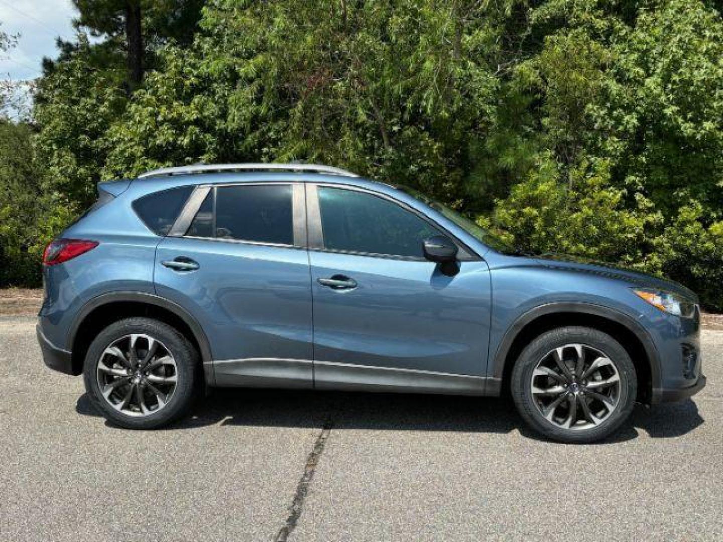 2016 /Black, leather Mazda CX-5 Grand Touring AWD (JM3KE4DY3G0) with an 2.5L L4 DOHC 16V engine, 6-Speed Automatic transmission, located at 2761 East Hwy 501, Conway, SC, 29526, (843) 331-1151, 33.781528, -78.989883 - 2016 Mazda CX-5 Grand Touring AWD - Photo#2