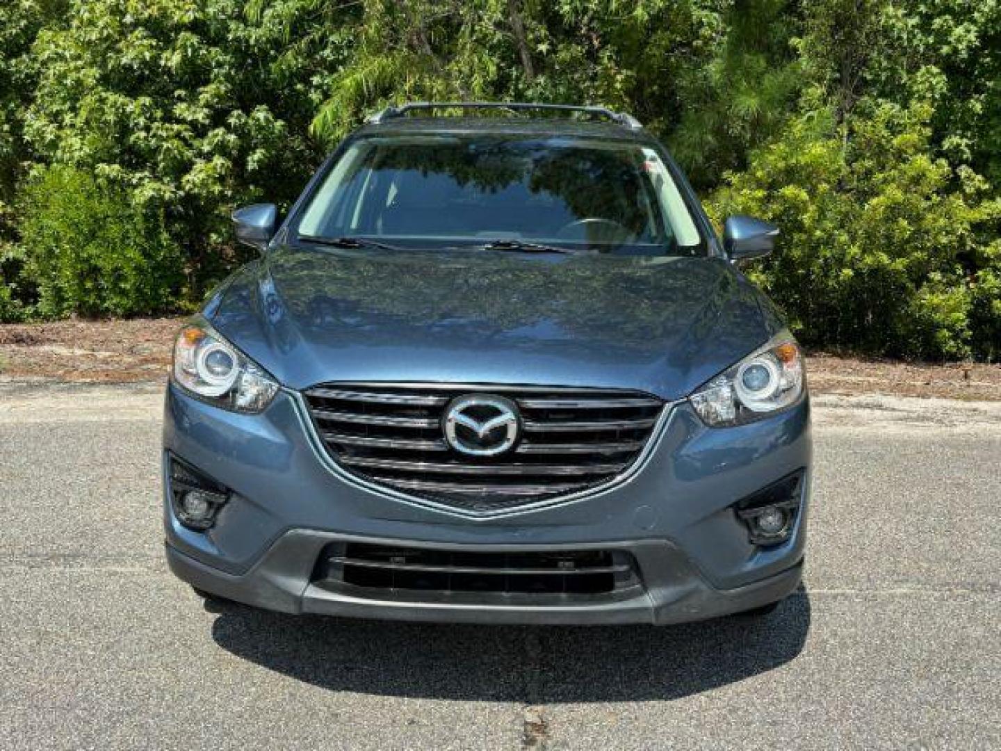 2016 /Black, leather Mazda CX-5 Grand Touring AWD (JM3KE4DY3G0) with an 2.5L L4 DOHC 16V engine, 6-Speed Automatic transmission, located at 2761 East Hwy 501, Conway, SC, 29526, (843) 331-1151, 33.781528, -78.989883 - 2016 Mazda CX-5 Grand Touring AWD - Photo#3