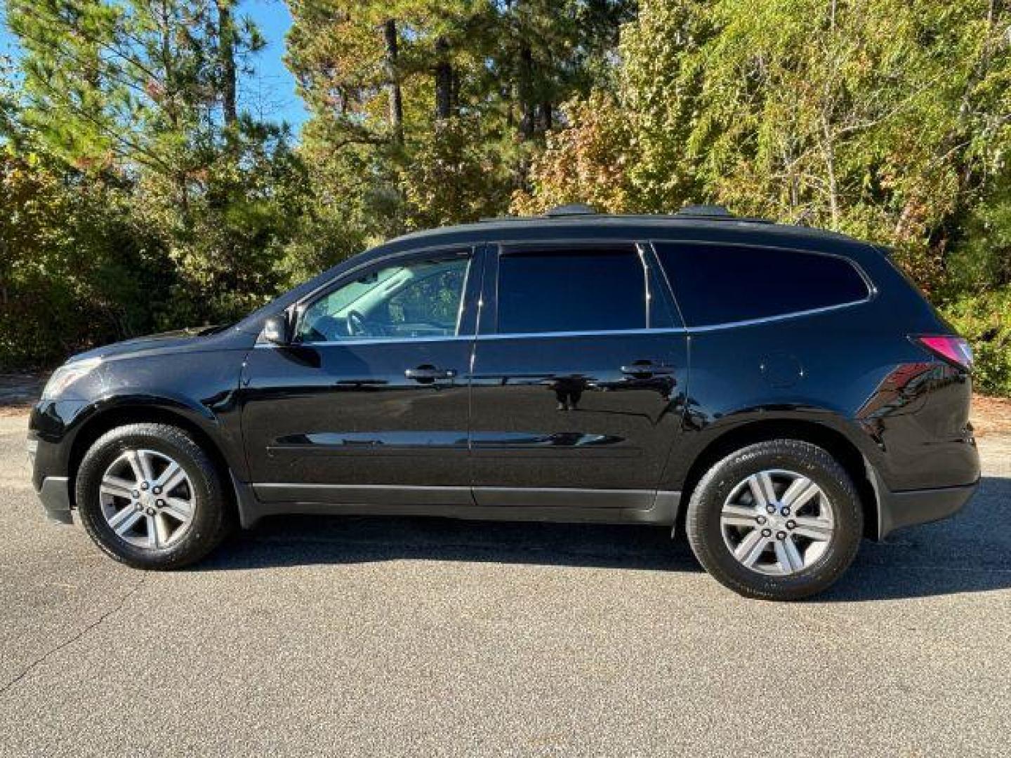 2017 /Ebony, leather Chevrolet Traverse 2LT AWD (1GNKVHKDXHJ) with an 3.6L V6 DOHC 24V engine, 6-Speed Automatic transmission, located at 9146 Ocean Hwy West, Calabash, NC, 28467, (910) 579-1110, 33.928635, -78.576157 - 2017 Chevrolet Traverse 2LT AWD - Photo#1