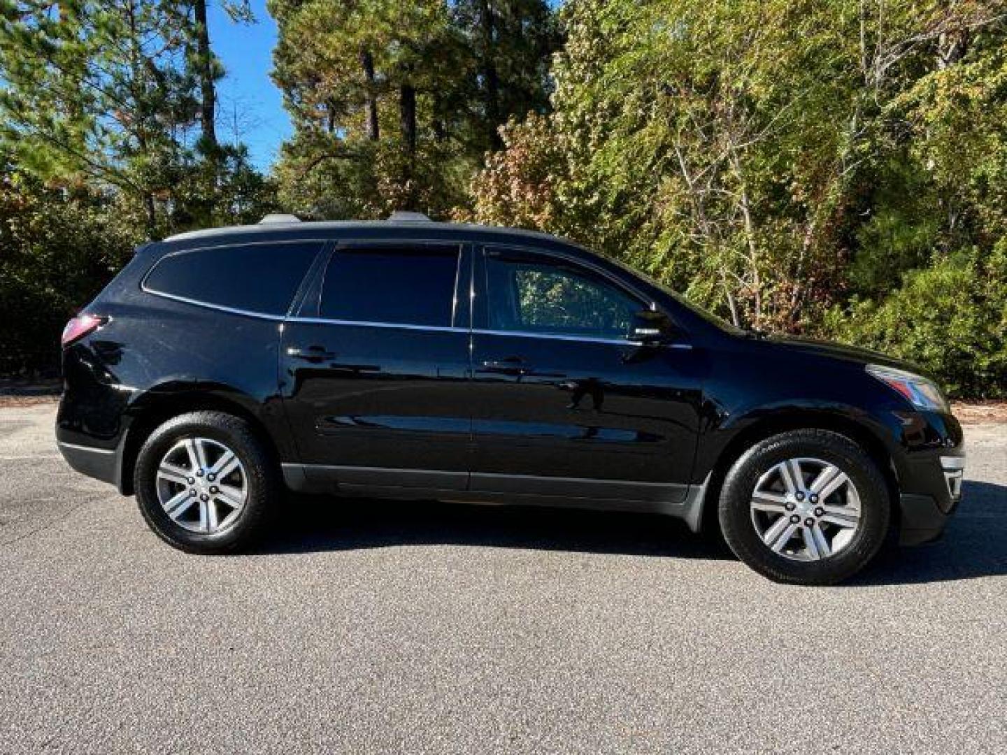 2017 /Ebony, leather Chevrolet Traverse 2LT AWD (1GNKVHKDXHJ) with an 3.6L V6 DOHC 24V engine, 6-Speed Automatic transmission, located at 9146 Ocean Hwy West, Calabash, NC, 28467, (910) 579-1110, 33.928635, -78.576157 - 2017 Chevrolet Traverse 2LT AWD - Photo#2