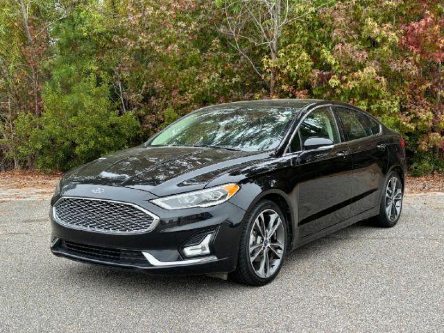 2020 /Ebony, leather Ford Fusion Titanium AWD (3FA6P0D99LR) with an 2.0L L4 DOHC 16V engine, 6-Speed Automatic transmission, located at 2761 East Hwy 501, Conway, SC, 29526, (843) 331-1151, 33.781528, -78.989883 - 2020 Ford Fusion Titanium AWD - Photo#0