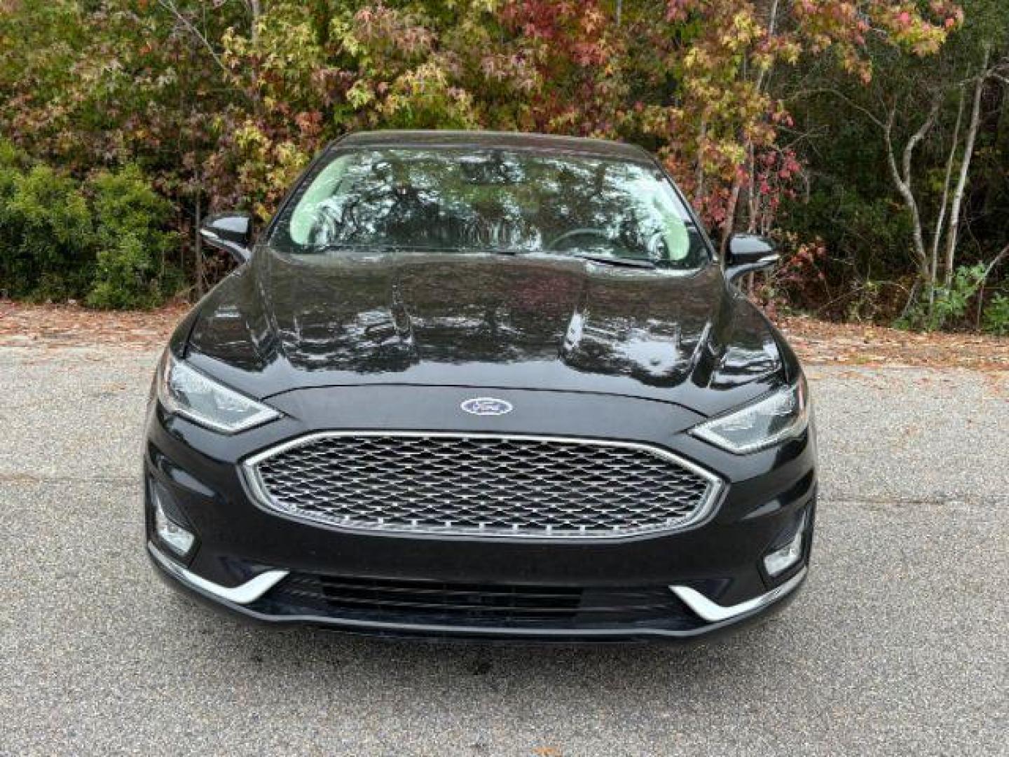 2020 /Ebony, leather Ford Fusion Titanium AWD (3FA6P0D99LR) with an 2.0L L4 DOHC 16V engine, 6-Speed Automatic transmission, located at 2761 East Hwy 501, Conway, SC, 29526, (843) 331-1151, 33.781528, -78.989883 - 2020 Ford Fusion Titanium AWD - Photo#3