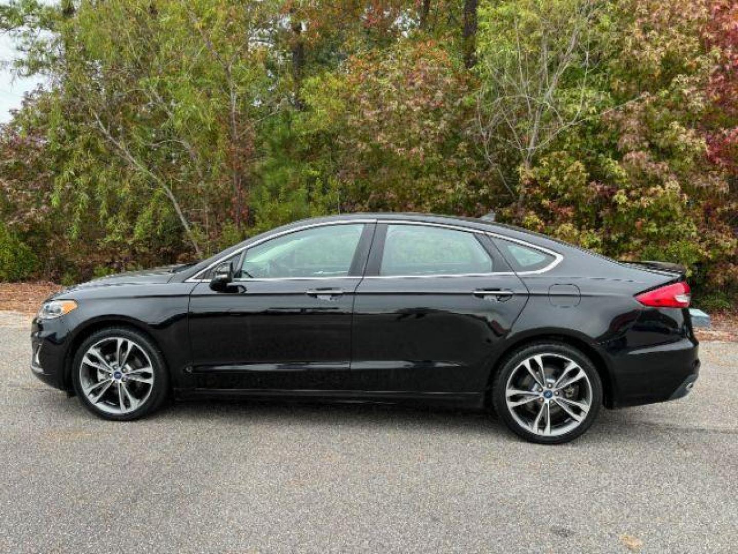 2020 /Ebony, leather Ford Fusion Titanium AWD (3FA6P0D99LR) with an 2.0L L4 DOHC 16V engine, 6-Speed Automatic transmission, located at 2761 East Hwy 501, Conway, SC, 29526, (843) 331-1151, 33.781528, -78.989883 - 2020 Ford Fusion Titanium AWD - Photo#1