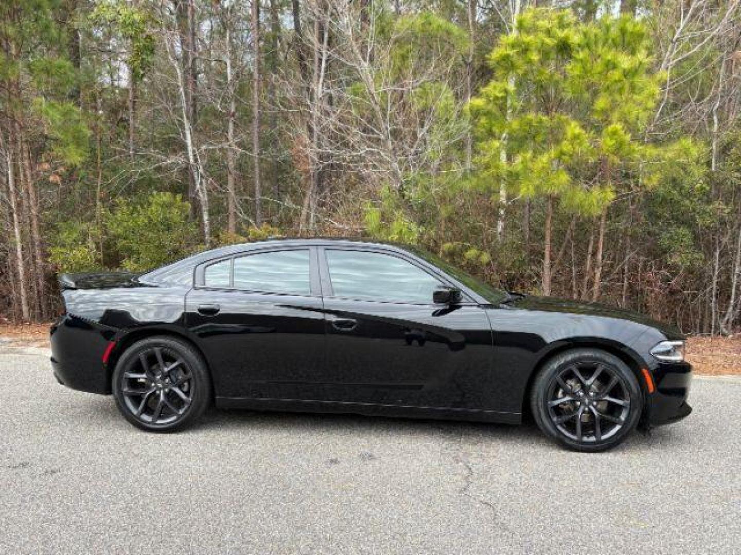 2021 /Black, cloth Dodge Charger SXT (2C3CDXBG5MH) with an 3.6L V6 DOHC 24V engine, 8-Speed Automatic transmission, located at 9146 Ocean Hwy West, Calabash, NC, 28467, (910) 579-1110, 33.928635, -78.576157 - 2021 Dodge Charger SXT - Photo#2