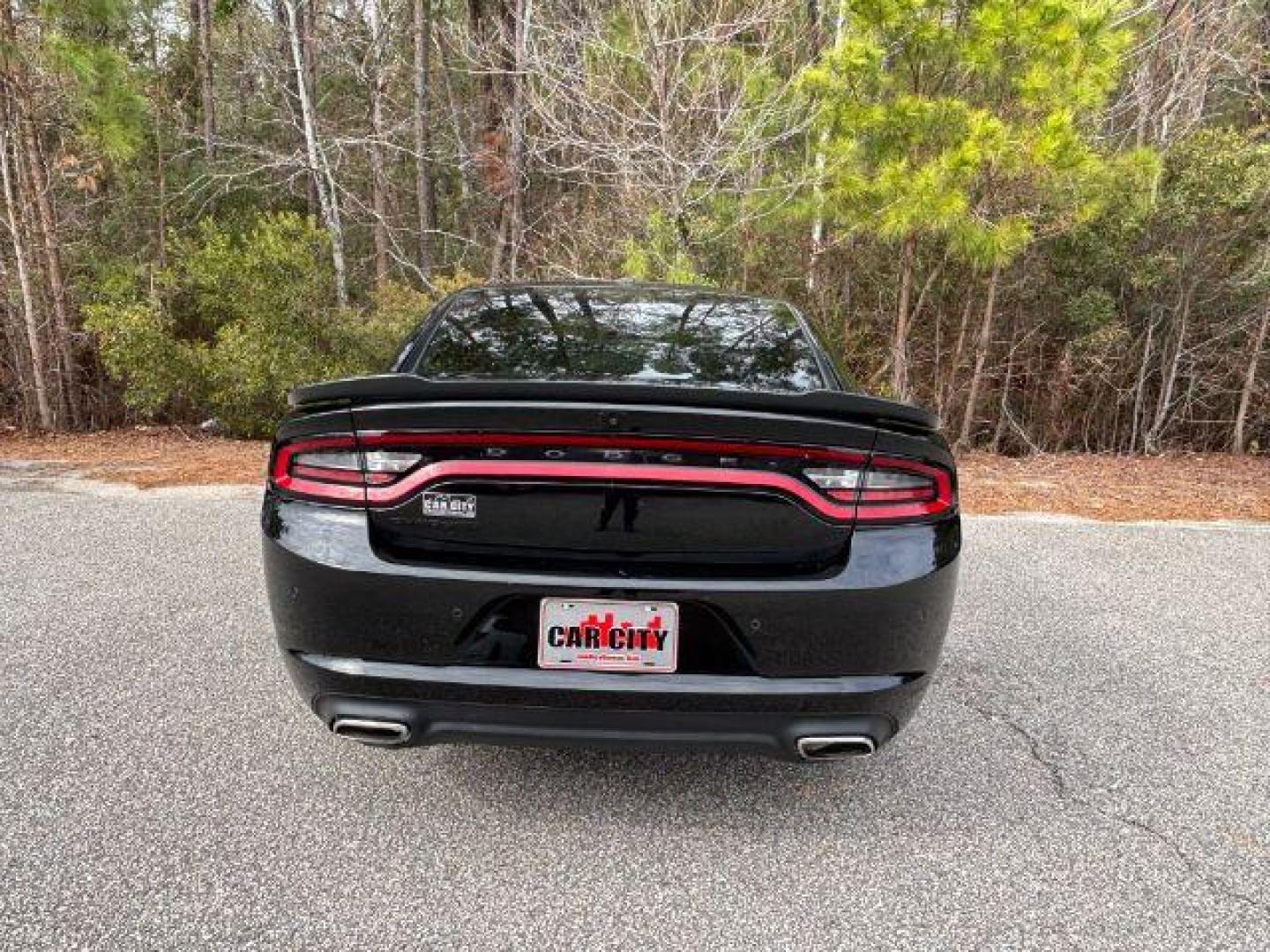 2021 /Black, cloth Dodge Charger SXT (2C3CDXBG5MH) with an 3.6L V6 DOHC 24V engine, 8-Speed Automatic transmission, located at 9146 Ocean Hwy West, Calabash, NC, 28467, (910) 579-1110, 33.928635, -78.576157 - 2021 Dodge Charger SXT - Photo#4