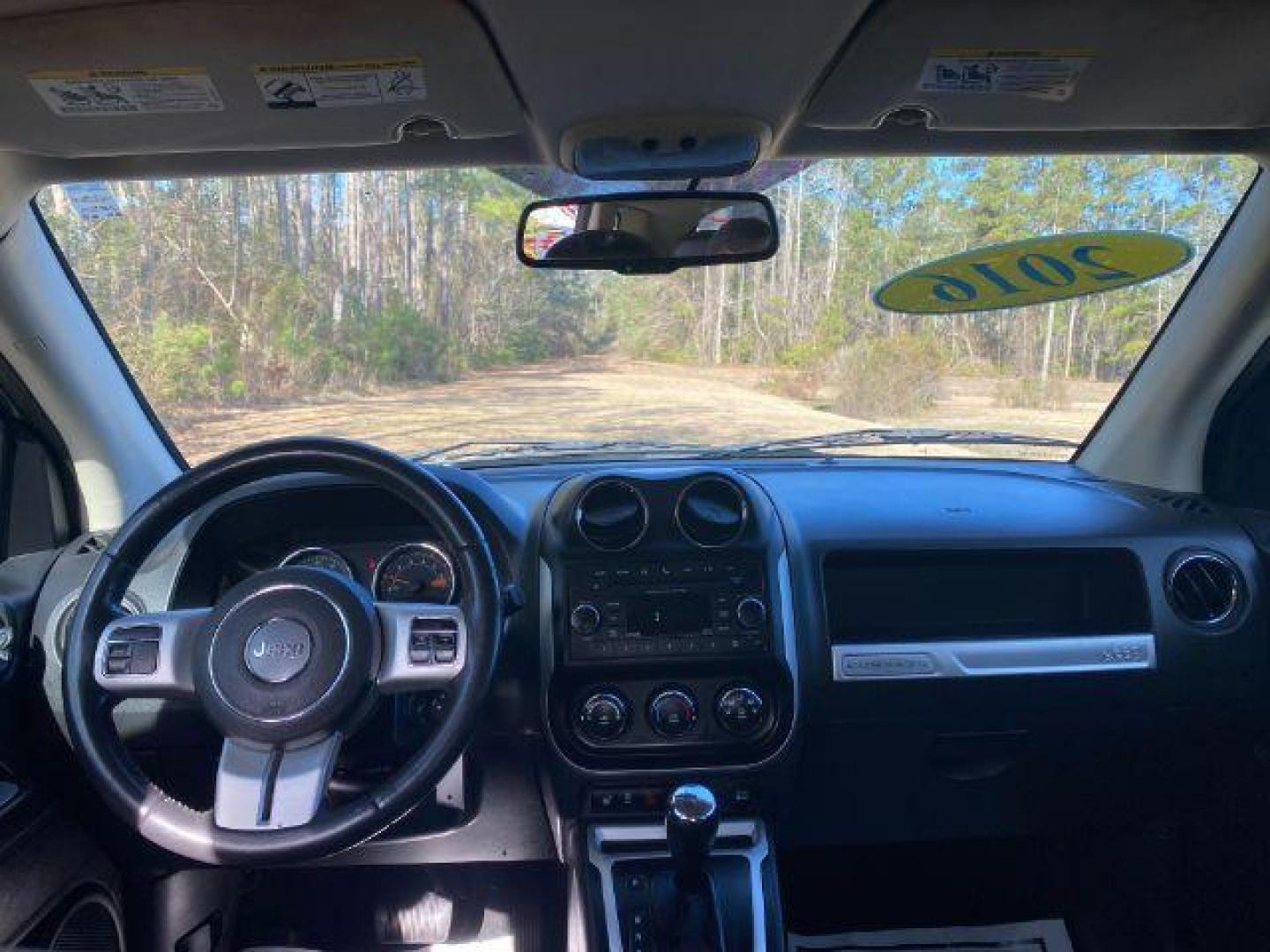 2016 Jeep Compass Latitude FWD (1C4NJCEA7GD) with an 2.0L L4 DOHC 16V engine, Continuously Variabl transmission, located at 9146 Ocean Hwy West, Calabash, NC, 28467, (910) 579-1110, 33.928635, -78.576157 - 2016 Jeep Compass Latitude FWD - Photo#5